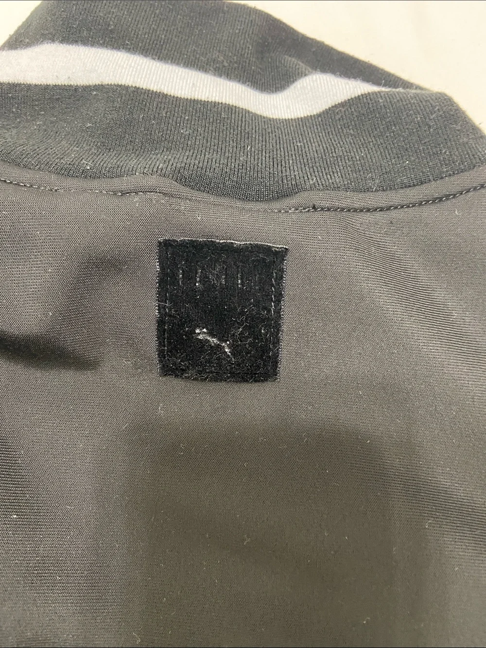 Puma (Fendy) by Rihanna Women’s Black & White Long Sleeve Track Jacket. Size- L